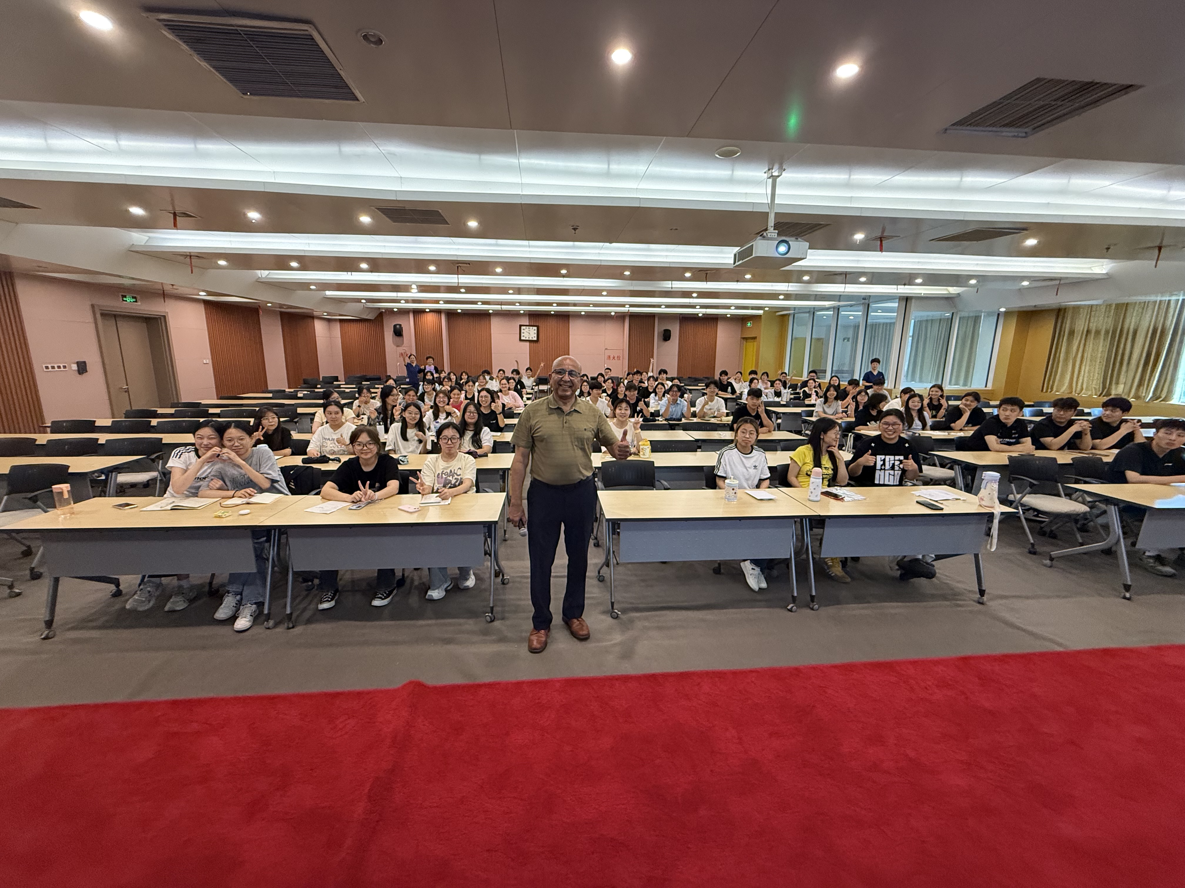 Wagih Mikhail, MBA, speaks to medical staff and students at Dong E Hospital, China
