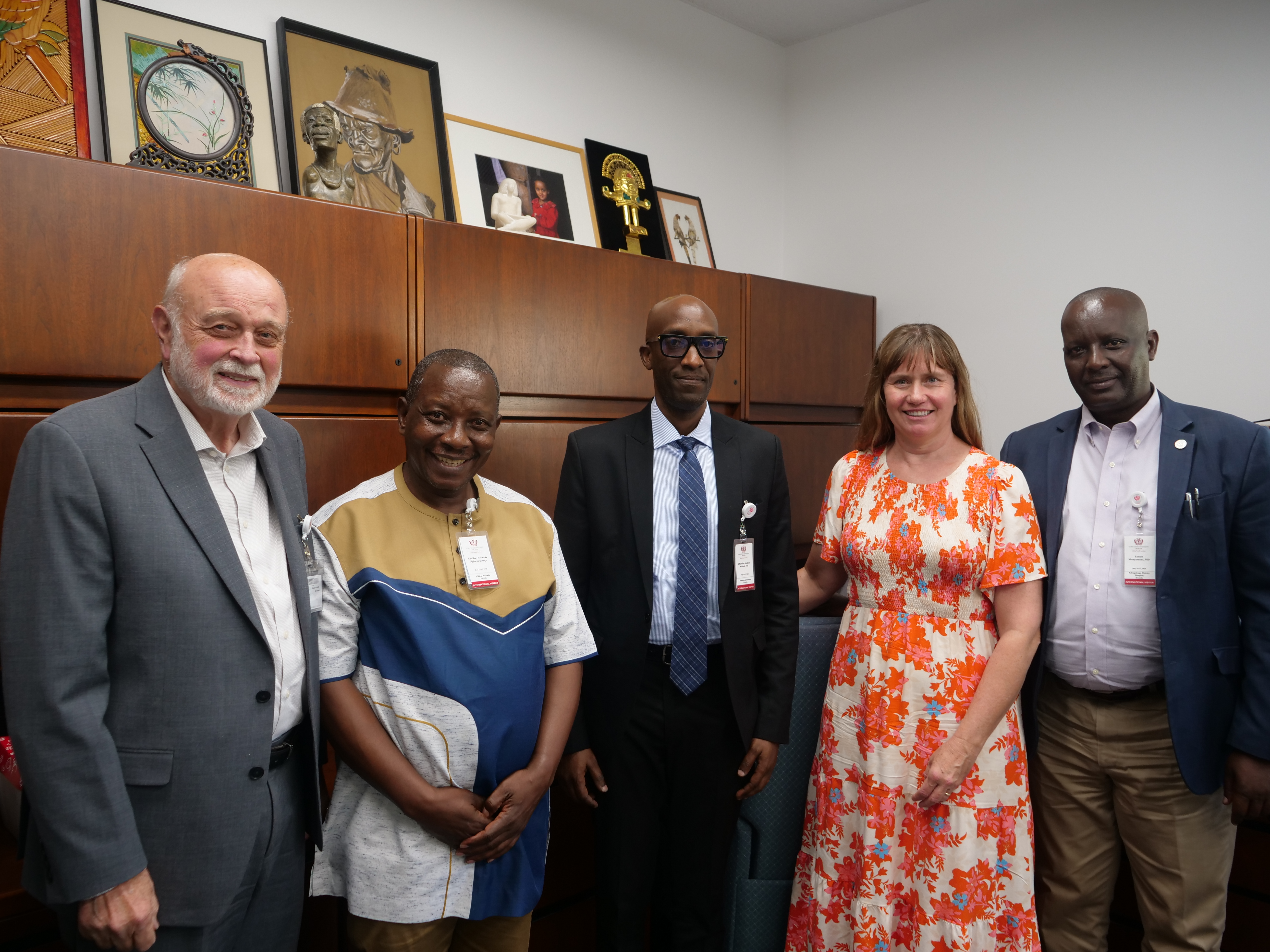 Ernest Munyemana, MD, Christian Mukesi Mutoni, MD and Geoffrey Serwada Ngiruwonsanga with Mindi Guptill, MD and Richard Hart, MD, DrPH.
