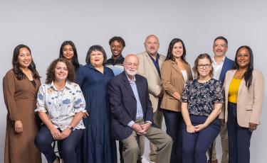 group photo of staff, faculty, students and volunteers