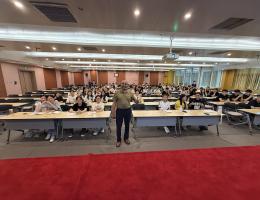 Wagih Mikhail, MBA, speaks to medical staff and students at Dong E Hospital, China