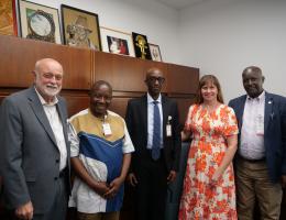 Ernest Munyemana, MD, Christian Mukesi Mutoni, MD and Geoffrey Serwada Ngiruwonsanga with Mindi Guptill, MD and Richard Hart, MD, DrPH.